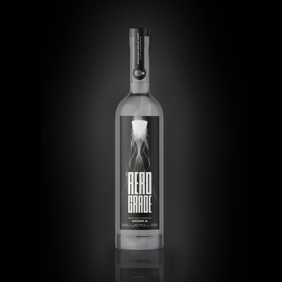 Bottle of vodka with a dark label on a black background
